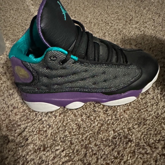 Air Jordan 13 Retros in a black, purple, and teal colorway - Picture 8 of 9